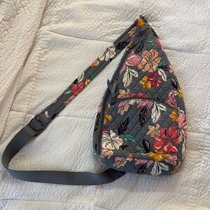 Floral quilted Vera Bradley Sling bag.